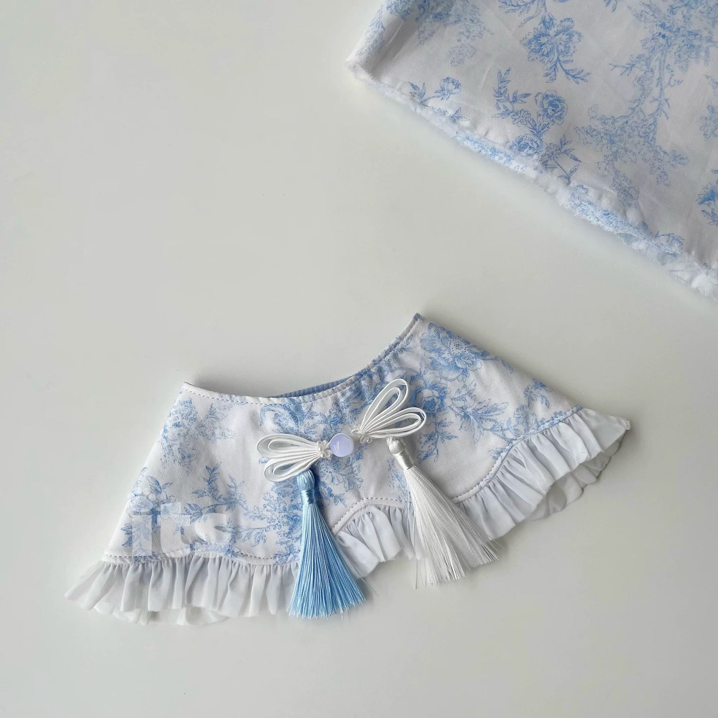 Serene Azure Ruffle Bib – "Youlan Chuiyi" Collection